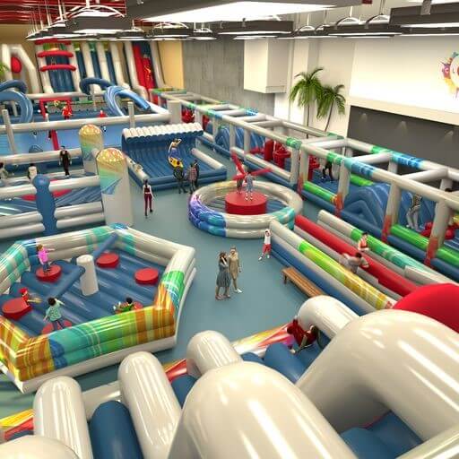 A vibrant indoor inflatable play area featuring various structures such as slides, obstacle courses, and bounce zones. Children and adults are seen enjoying the space, surrounded by colorful inflatable installations and a lively atmosphere.